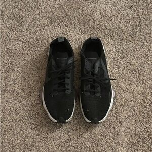 Nike Men's Black Sneakers with White Sole and Subtle Pink Accent